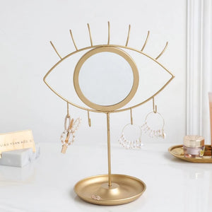 Gold eye makeup mirror