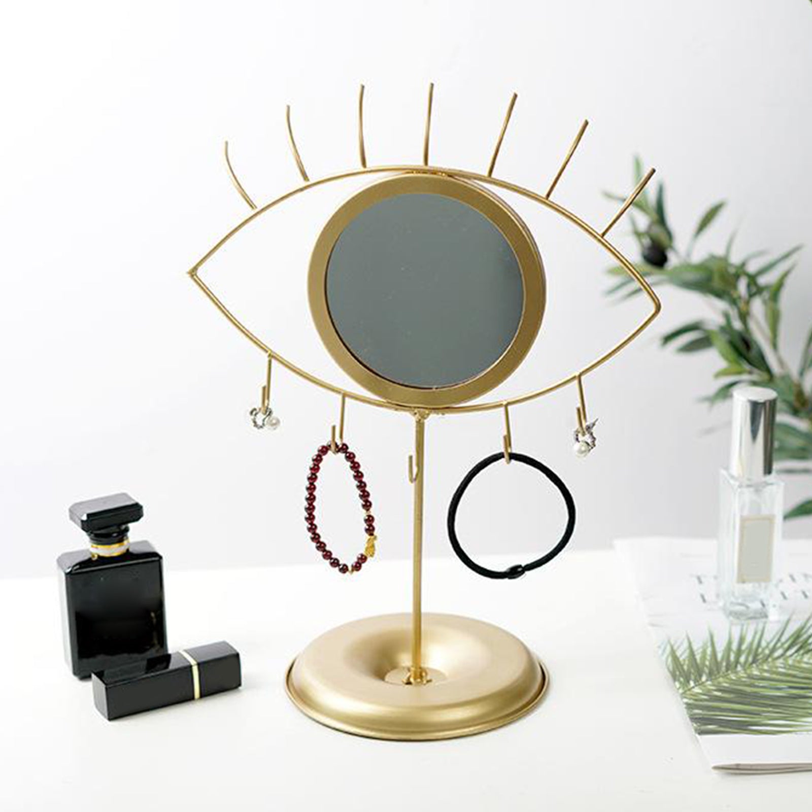 Gold eye makeup mirror